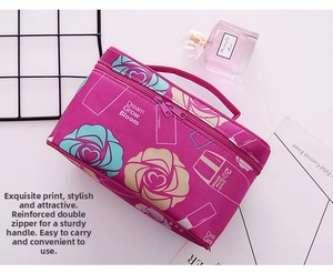Macro view of rose floral makeup bag with dual zippers and reinforced top handle
