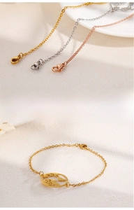 Detailed view of world map charms on thin link chains in gold, silver, and rose gold