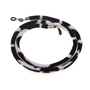Adjustable velvet sport eyewear strap with cow print pattern and black rubber loops