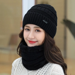 Women's black knit beanie and scarf set with warm fleece lining for winter outdoors