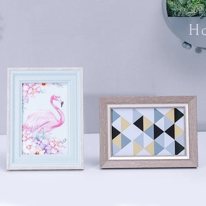 Nordic minimalist picture frames in light blue and wood grain for desktop home decor