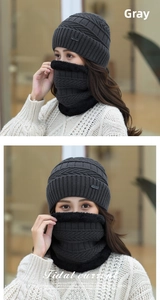 Detail of grey winter knit beanie and neck warmer set with soft faux fur fleece lining