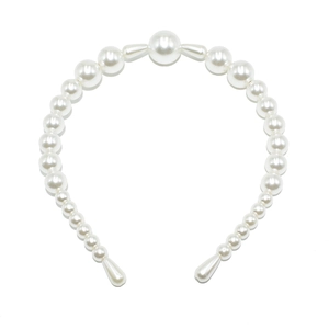 Detailed view of handmade white pearl headband with elegant gradient beads and drop charms