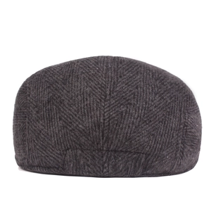 Detailed back view of dark grey herringbone patterned flat cap in wool blend fabric