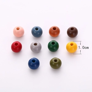 Macro shot of colorful 1.0cm wooden round beads for DIY jewelry and handmade crafts