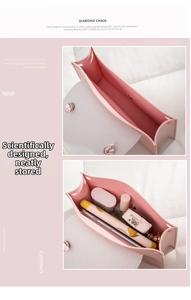 Pink and white faux leather clutch bag with organized internal space for cosmetics