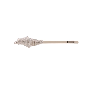 Close-up of a silver conch shell hairpin accessory on a clean white background