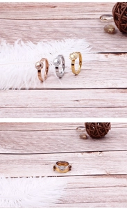 Detailed view of hexagon diamond rings in gold silver and rose gold stackable style