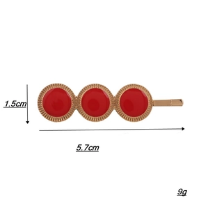 Vintage geometric round gold hair clip with red enamel details and size markings