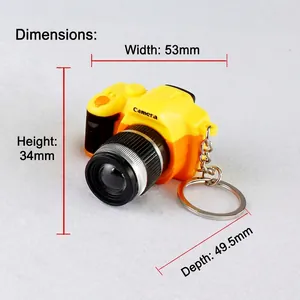 Miniature yellow camera keychain with LED sound, measuring 53x34x49.5mm for students