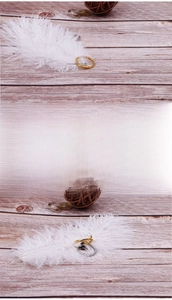 Detailed view of rose gold plated hugging hands open ring on a rustic wooden background