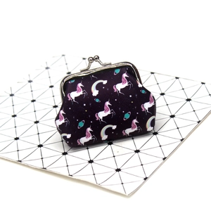 Detail view of unicorn coin purse with vintage metal clasp and rainbow pattern