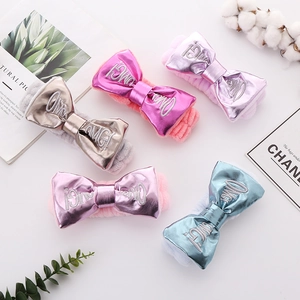 Plush OMG bow headbands in five colors for washing face and makeup routines