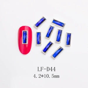 Macro detail of LF-D44 blue crystal nail gem with silver metal edge in 4.2*10.5mm size