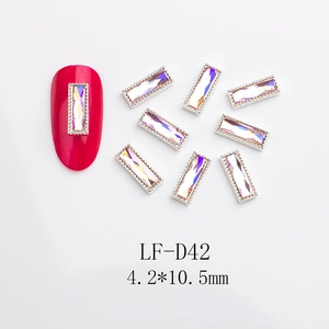 Detailed view of Aurora AB rectangular rhinestones with silver metal edges for nail art