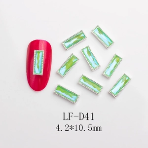 Detail of 4.2x10.5mm mocha teal gradient rectangle nail rhinestones with silver metal edges