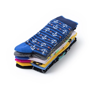 Close-up of stacked colorful cotton crew socks showing soft knit texture and nautical patterns