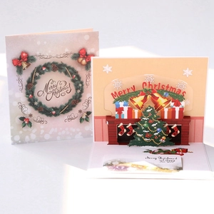 3D Pop-up Christmas card with colorful printed mini tree and festive holiday greetings