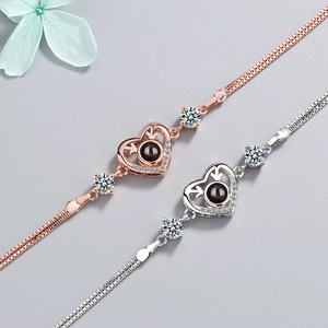 Elegant deer projection heart bracelet with rose gold and silver finish and zircons