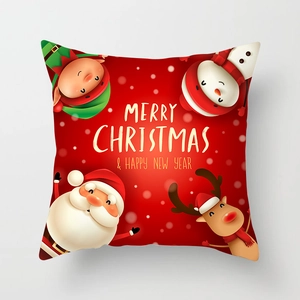 Detail of red Christmas pillowcase with Santa Claus, Snowman and holiday greetings
