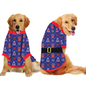 Detailed view of blue Christmas dog sweater with snowflake and gift patterns on Golden Retrievers
