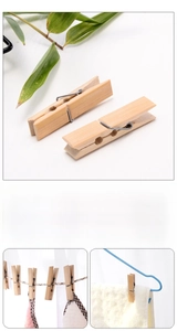 Macro view of durable bamboo clothes pegs with strong metal springs for laundry drying