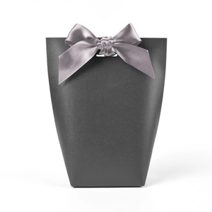 Dark grey paper gift box featuring a matching satin ribbon bow on white background