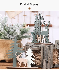 Detail of DIY wooden Christmas tree and reindeer desk ornaments with XMAS laser cut design