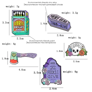 Detailed size and weight chart for five gothic enamel skull and coffin brooches