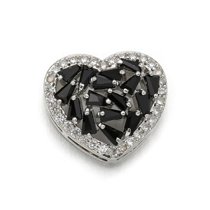Macro view of heart connector pendant with micro-paved black zircon and silver finish