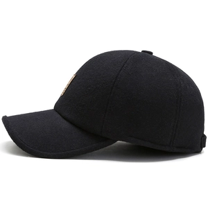 Men's winter wool felt baseball cap in black with ear protection and leather side patch