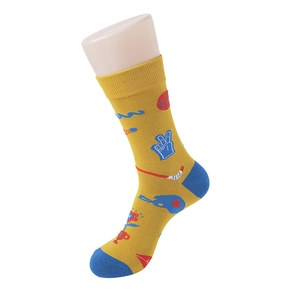 Detailed knit texture of mustard yellow crew socks with blue heel and sports icons