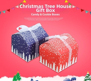 House-shaped Christmas gift boxes in red and blue with white tree patterns and ribbon bows