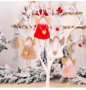 Detailed view of four colorful plush angel dolls with sequin wings on white branches