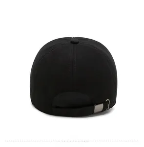 Detail of the back of the black wool baseball cap featuring an adjustable metal buckle