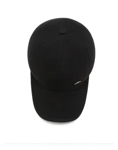 Top view of black winter baseball cap for men with premium metal logo and six-panel design