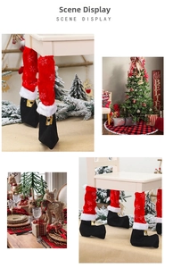 Detail of Christmas chair leg covers with red snowflake embroidery and gold buckle accents