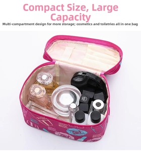 Top view of floral rose red makeup bag with multiple compartments for cosmetics