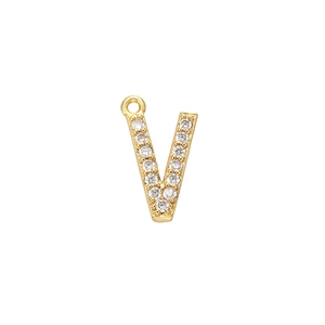 Close-up of golden V-shaped pendant with pavé cubic zirconia on a white background