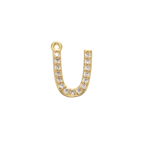 Close-up of gold-plated letter U pendant with micro-pave white zircon crystals