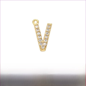 Macro shot of gold-plated brass V-letter pendant with micro-pave cubic zirconia