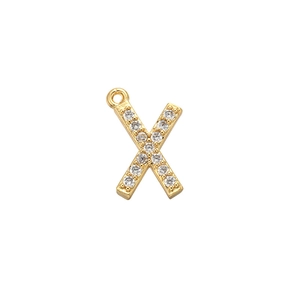 Detailed view of a gold-plated letter X pendant micro-set with sparkling cubic zirconia