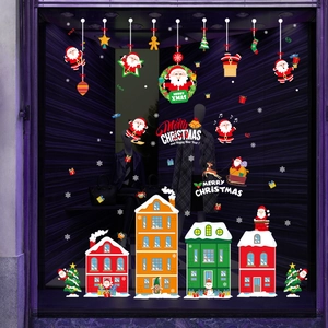 Festive Christmas wall stickers with Santa, houses, and snow for window home decoration
