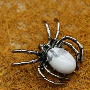 Gothic spider brooch and pendant featuring vintage silver metal and white stone inlay