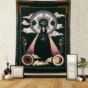 Detail of mystic skeleton tapestry with moon and sun symbols on a neutral wall decor
