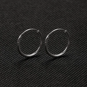Minimalist silver hoop earrings for men and women with polished metal finish