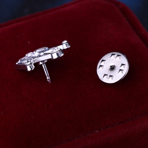 Silver crown lapel pin with clear crystals on red velvet box for men's suits