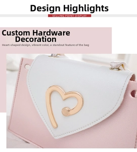 Macro detail of golden heart-shaped metal buckle on a pink and white patchwork crossbody bag