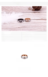 Detailed view of 6mm stainless steel couples rings with interlocking heart design