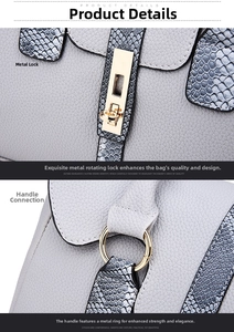 Close-up of golden swivel lock and snakeskin texture on grey faux leather handbag